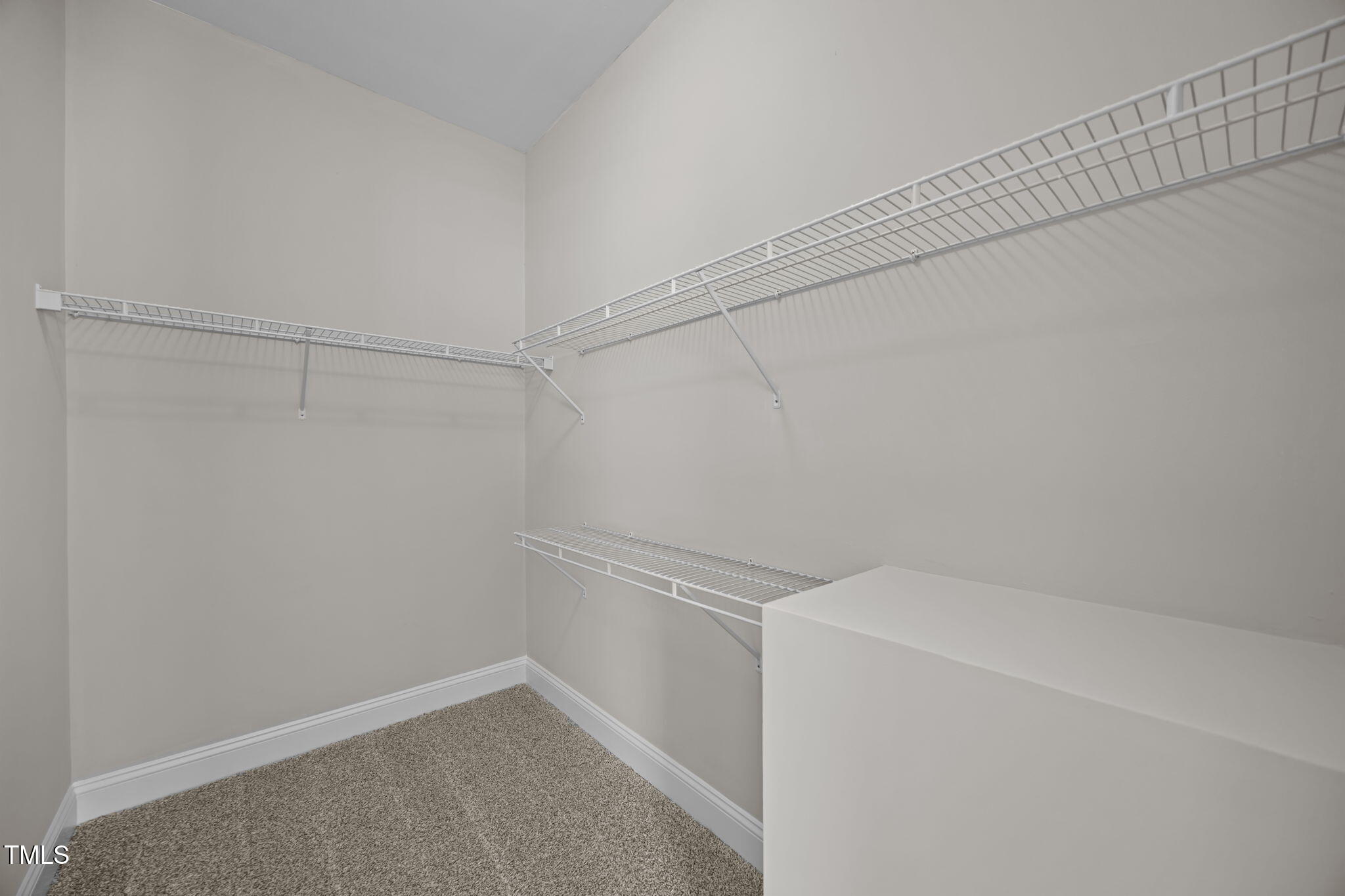 6117 David Moore Road Burlington, NC 27217 - Photo 28 of 51 a view of small space with racks on the wall