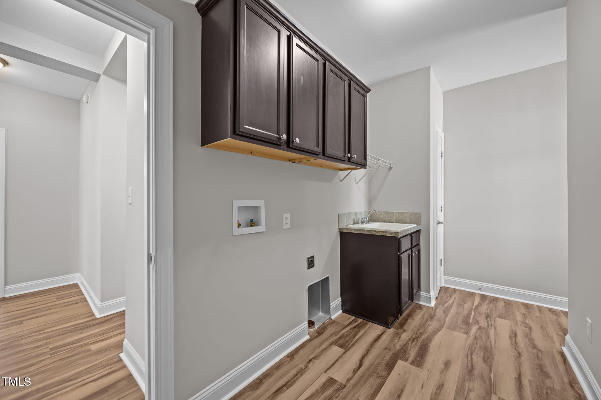 6117 David Moore Road Burlington, NC 27217 - Photo 29 of 51 a view of a hallway with wooden floor and staircase