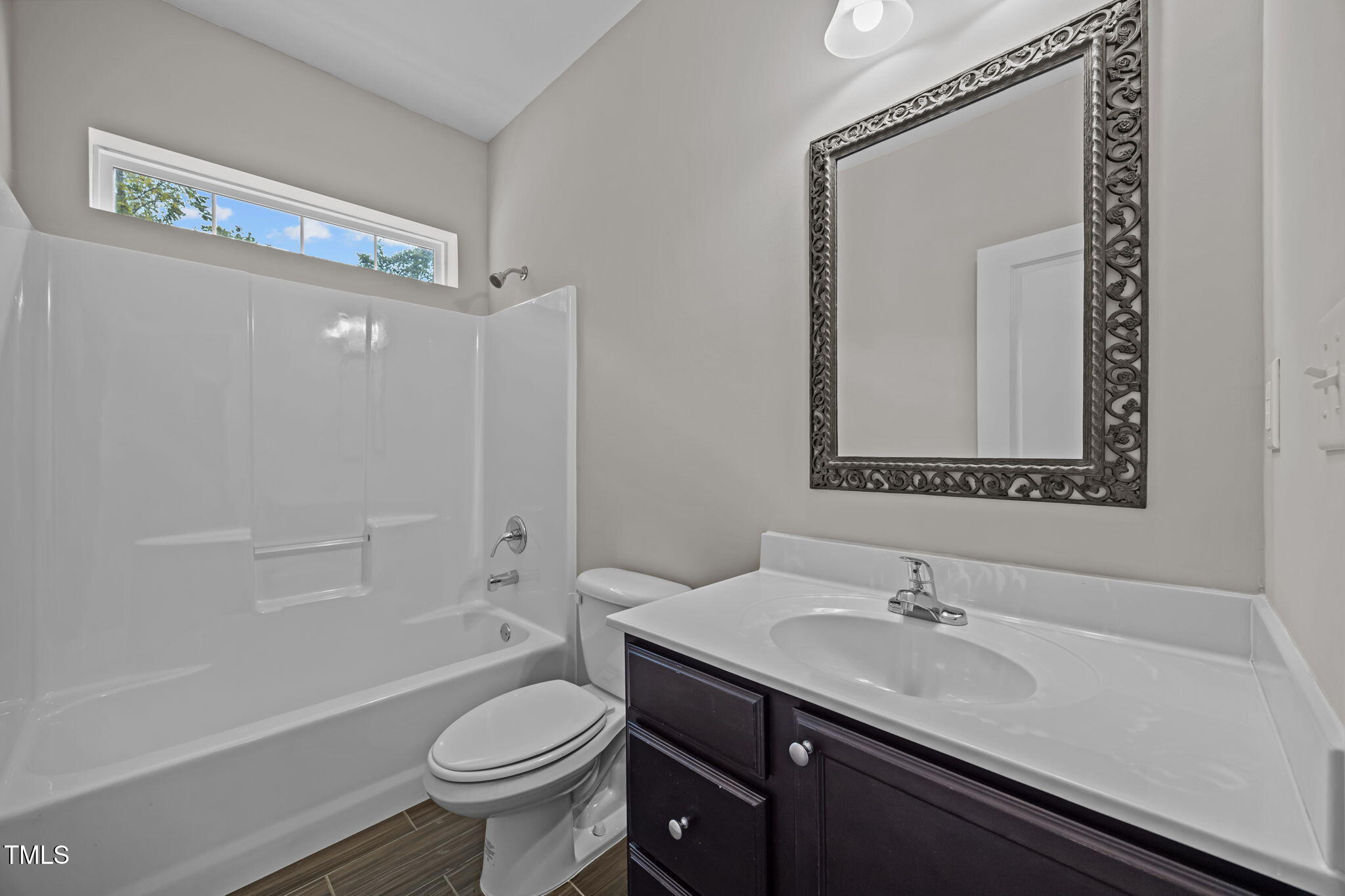 6117 David Moore Road Burlington, NC 27217 - Photo 36 of 51 a bathroom with a granite countertop sink toilet and a mirror
