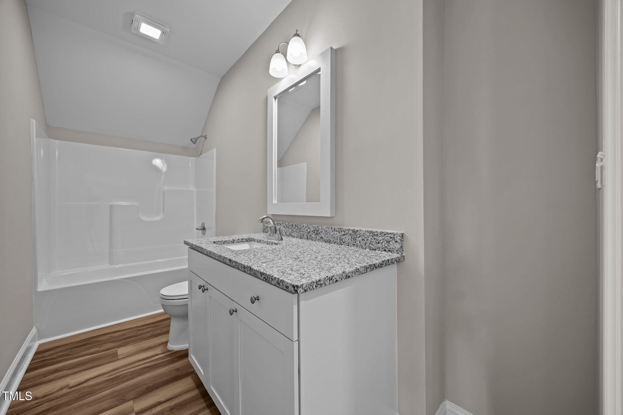 6117 David Moore Road Burlington, NC 27217 - Photo 38 of 51 a bathroom with a granite countertop sink and a mirror