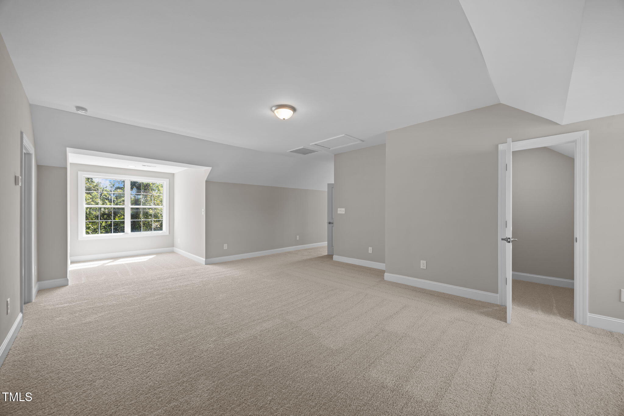 6117 David Moore Road Burlington, NC 27217 - Photo 39 of 51 a view of an empty room with a window