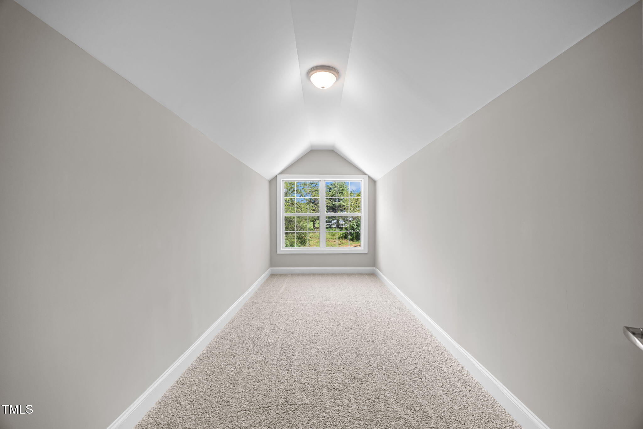 6117 David Moore Road Burlington, NC 27217 - Photo 42 of 51 an empty room with a window and a ceiling fan