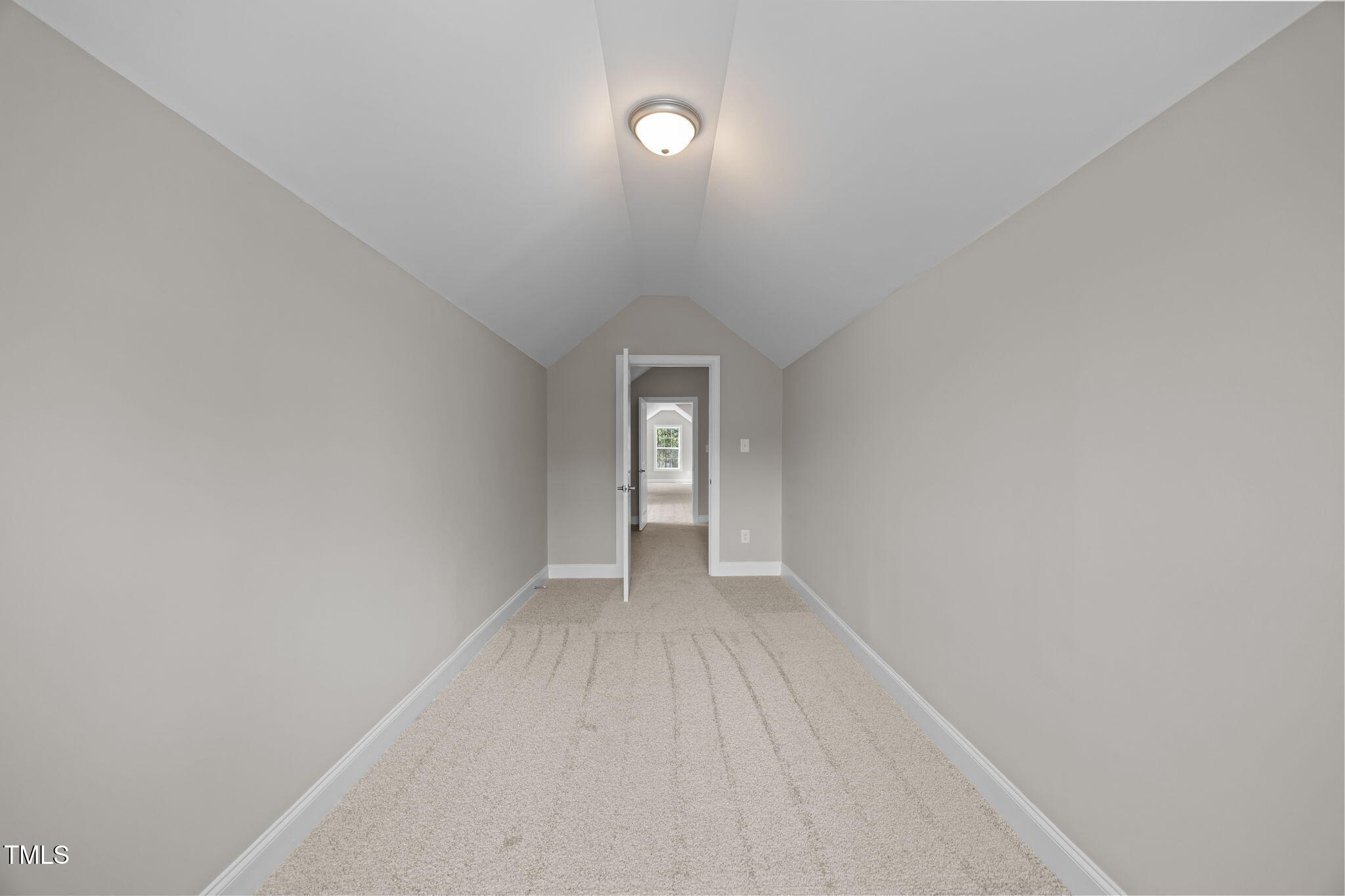 6117 David Moore Road Burlington, NC 27217 - Photo 43 of 51 a view of an empty room with wooden floor and windows