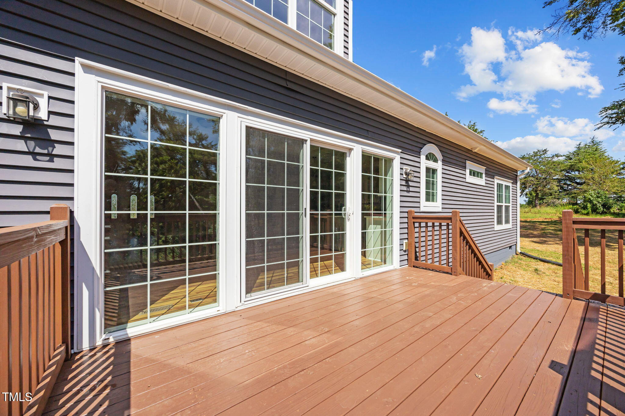 6117 David Moore Road Burlington, NC 27217 - Photo 45 of 51 a view of a house with a balcony