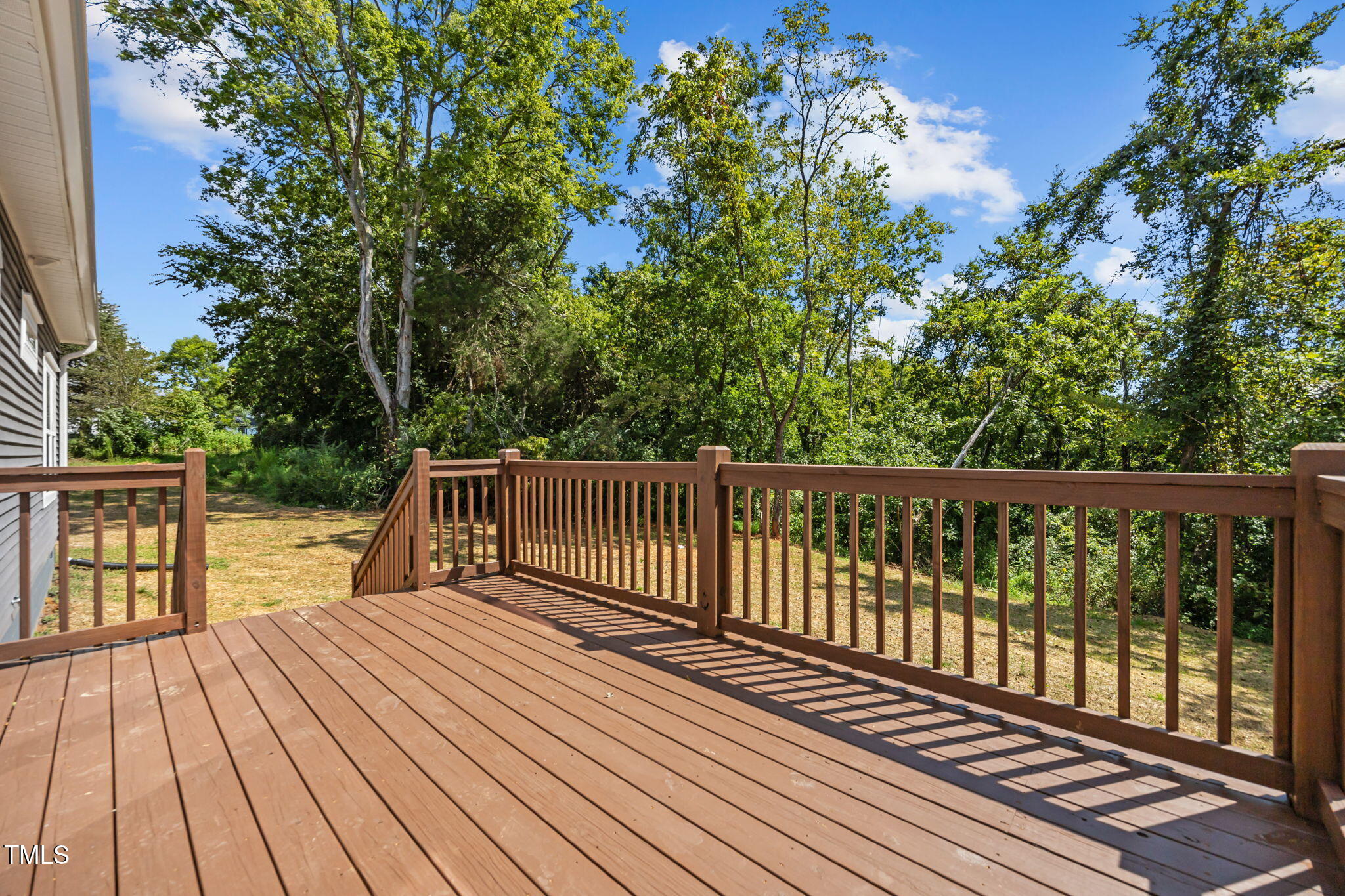 6117 David Moore Road Burlington, NC 27217 - Photo 46 of 51 a view of balcony with wooden floor and fence