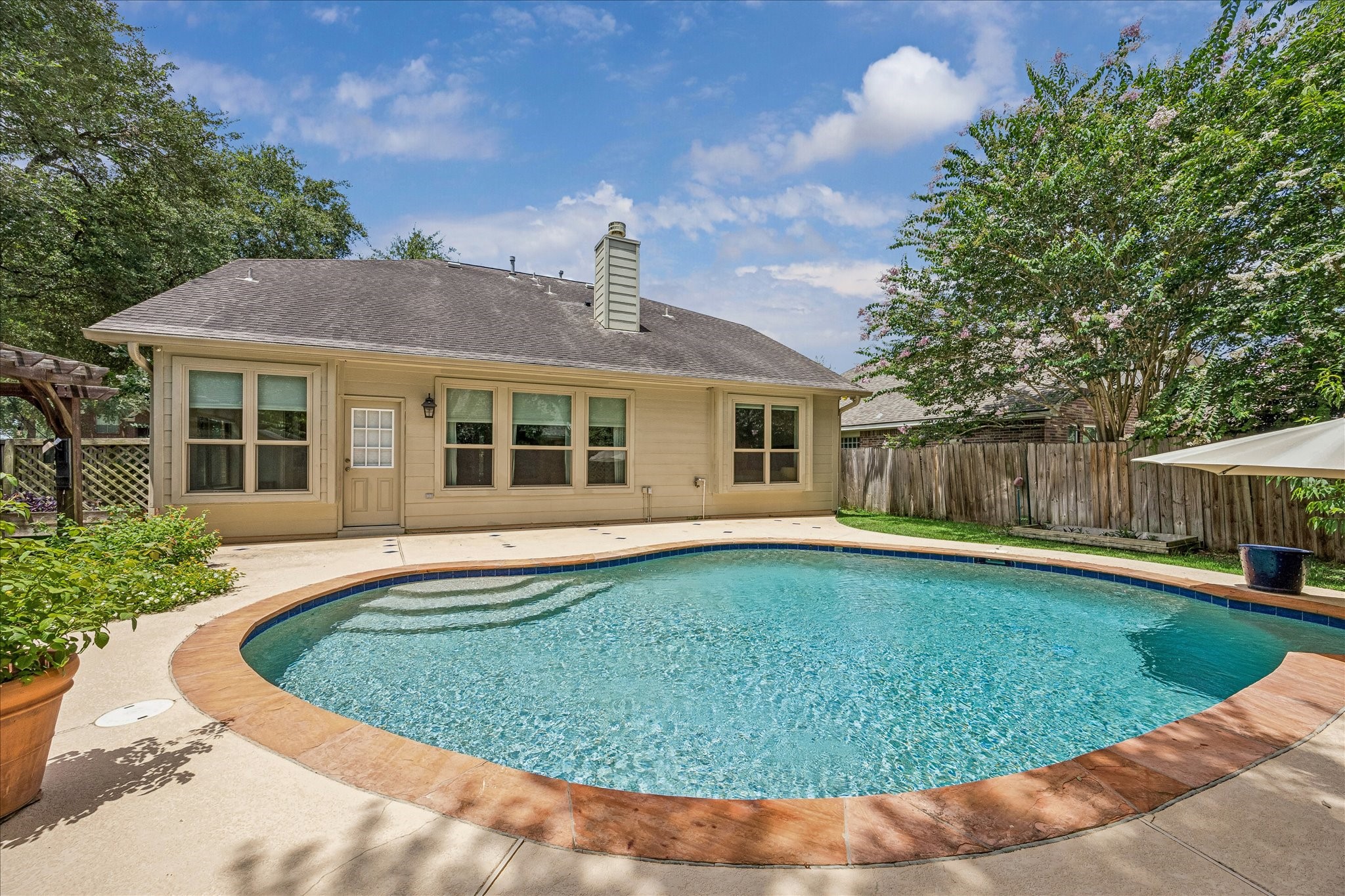 5811 Walkabout Way Katy, TX 77450 - Photo 2 of 33 Private backyard oasis complete with professionally resurfaced pool and upgraded pool pump system.