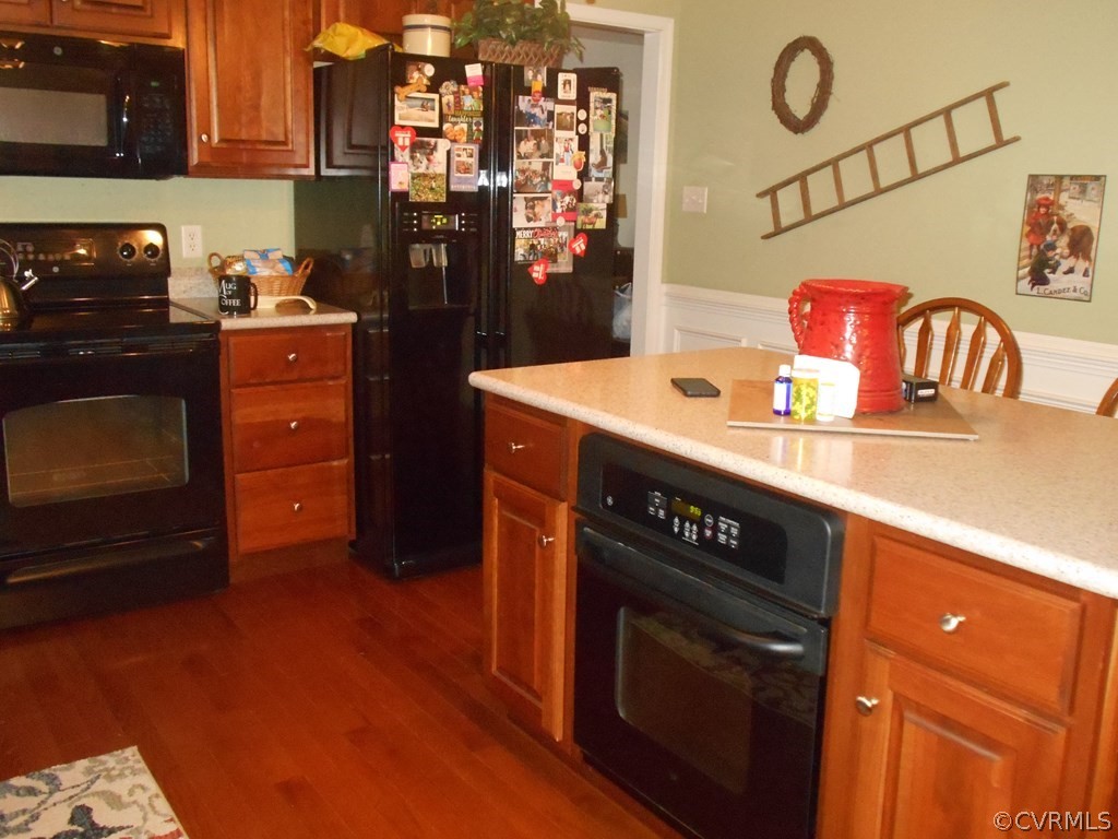 1925 Hill Cross Road Charlotte Court House, VA 23923 - Photo 13 of 50 a kitchen with stainless steel appliances granite countertop a stove a refrigerator and a microwave