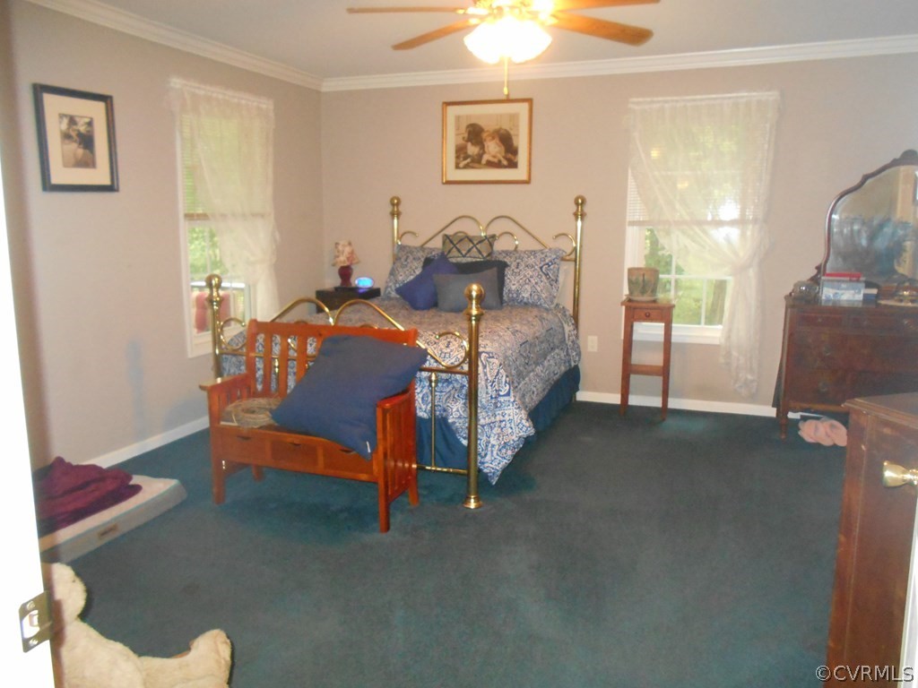 1925 Hill Cross Road Charlotte Court House, VA 23923 - Photo 17 of 50 a bedroom with a bed and a window