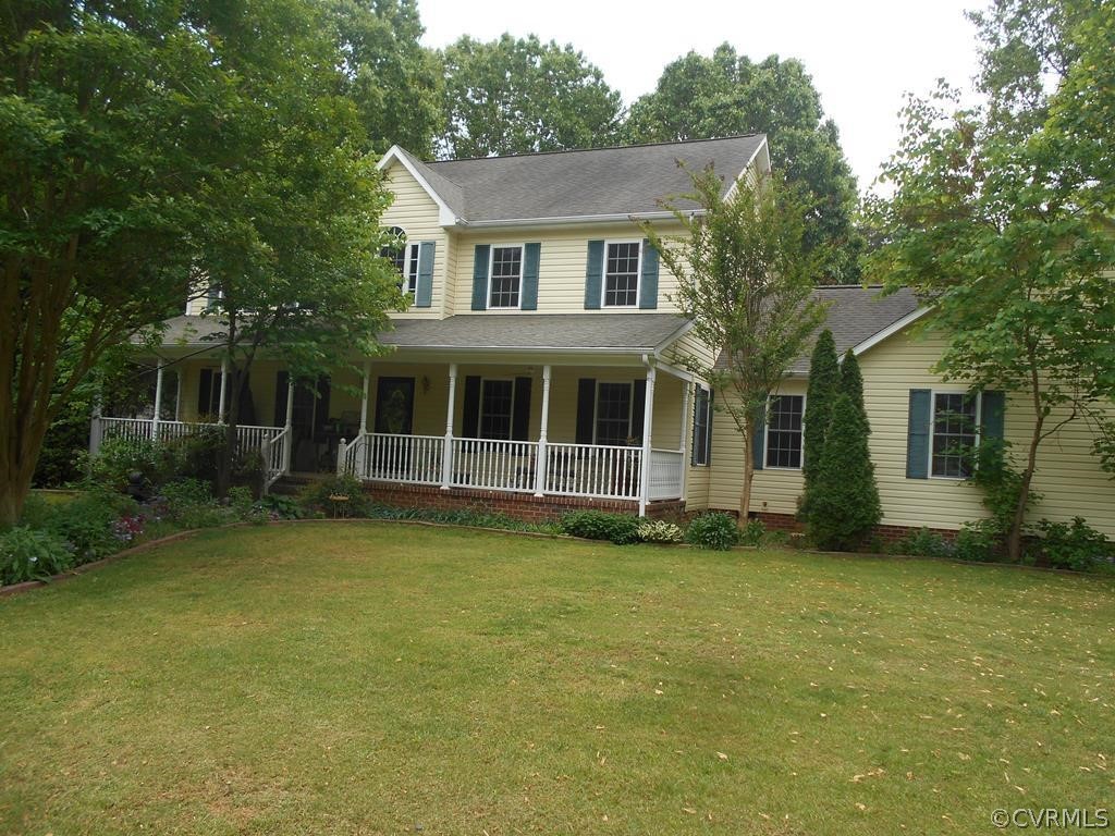 1925 Hill Cross Road Charlotte Court House, VA 23923 - Photo 2 of 50 a view of a house with a garden