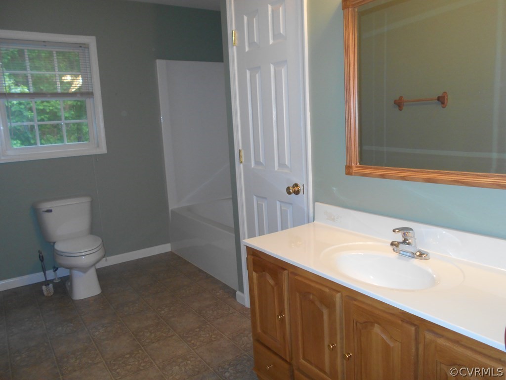1925 Hill Cross Road Charlotte Court House, VA 23923 - Photo 25 of 50 a bathroom with a sink vanity and a toilet