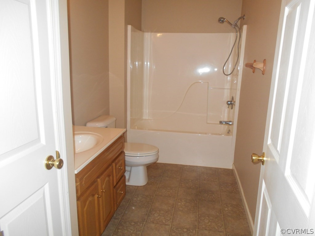 1925 Hill Cross Road Charlotte Court House, VA 23923 - Photo 28 of 50 a bathroom with a granite countertop bathtub shower sink vanity and toilet