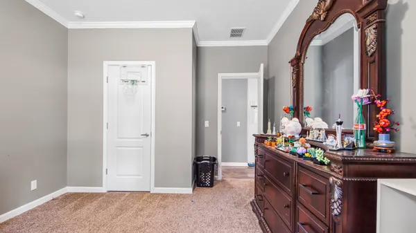 a kitchen that has a lot of fruit on it and cabinets