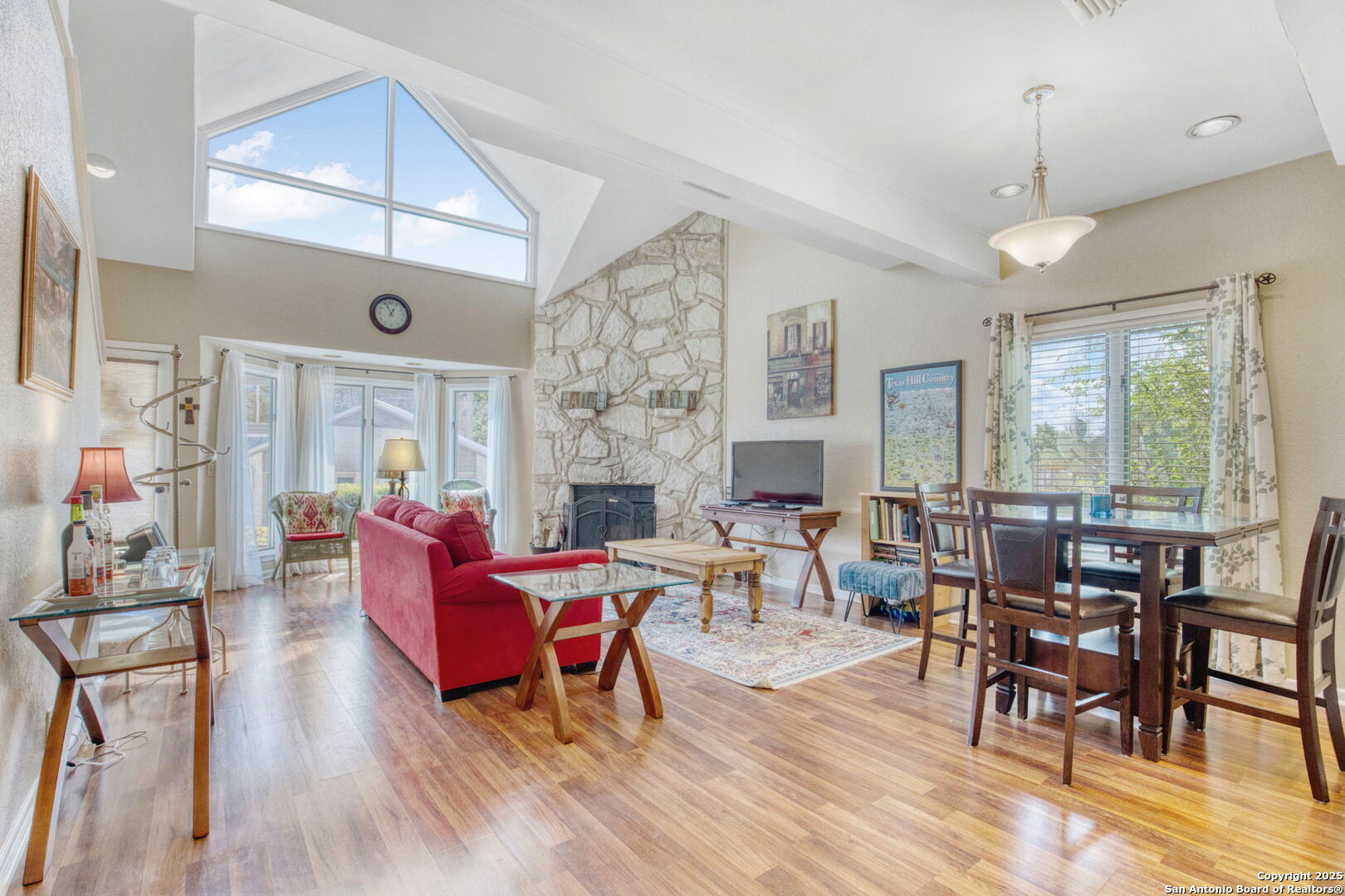 805 Highway 534 Loop, Unit 122 Kerrville, TX 78028 - Photo 14 of 30 a living room with furniture dining table and a large window