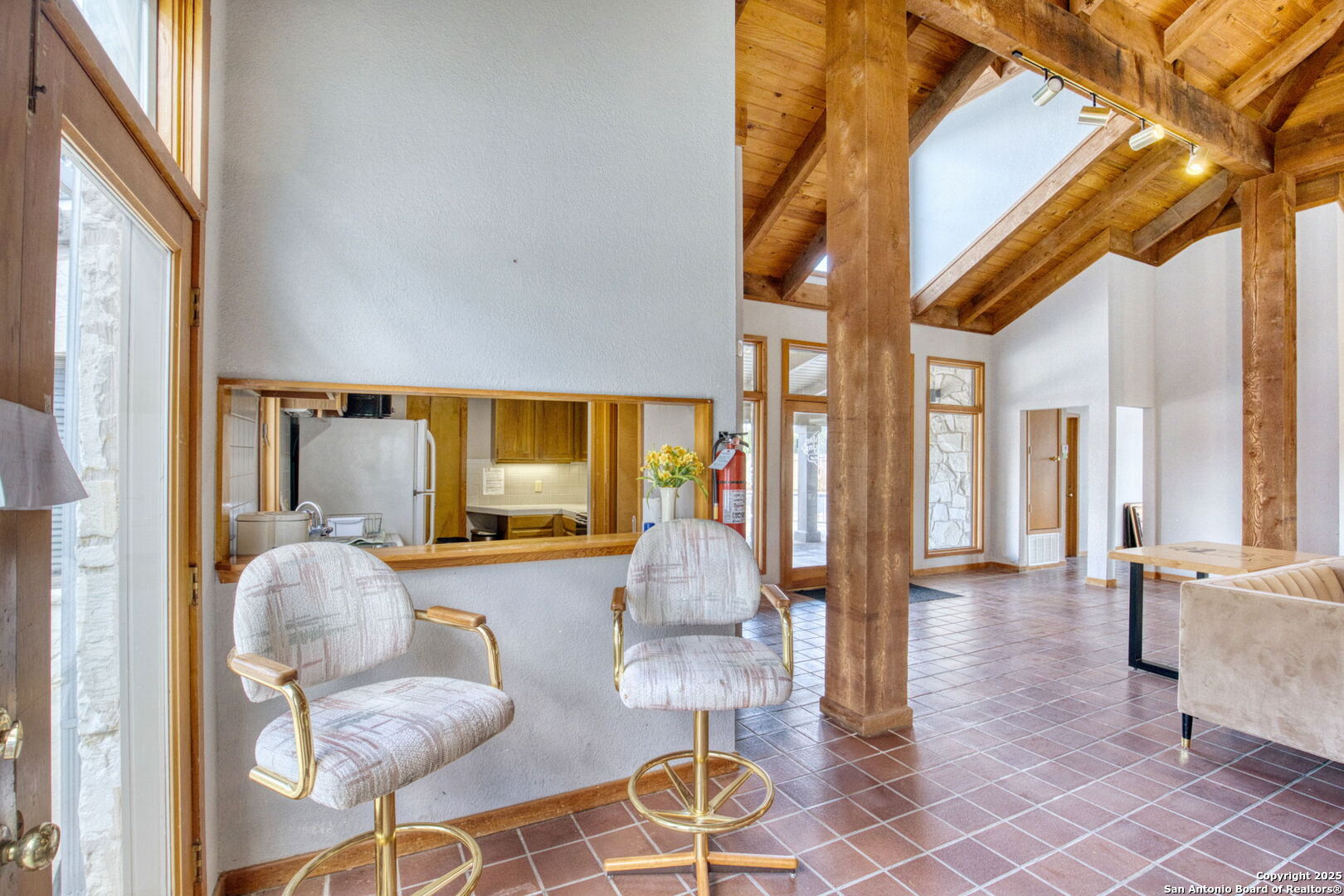 805 Highway 534 Loop, Unit 122 Kerrville, TX 78028 - Photo 27 of 30 a living room with furniture and a large window