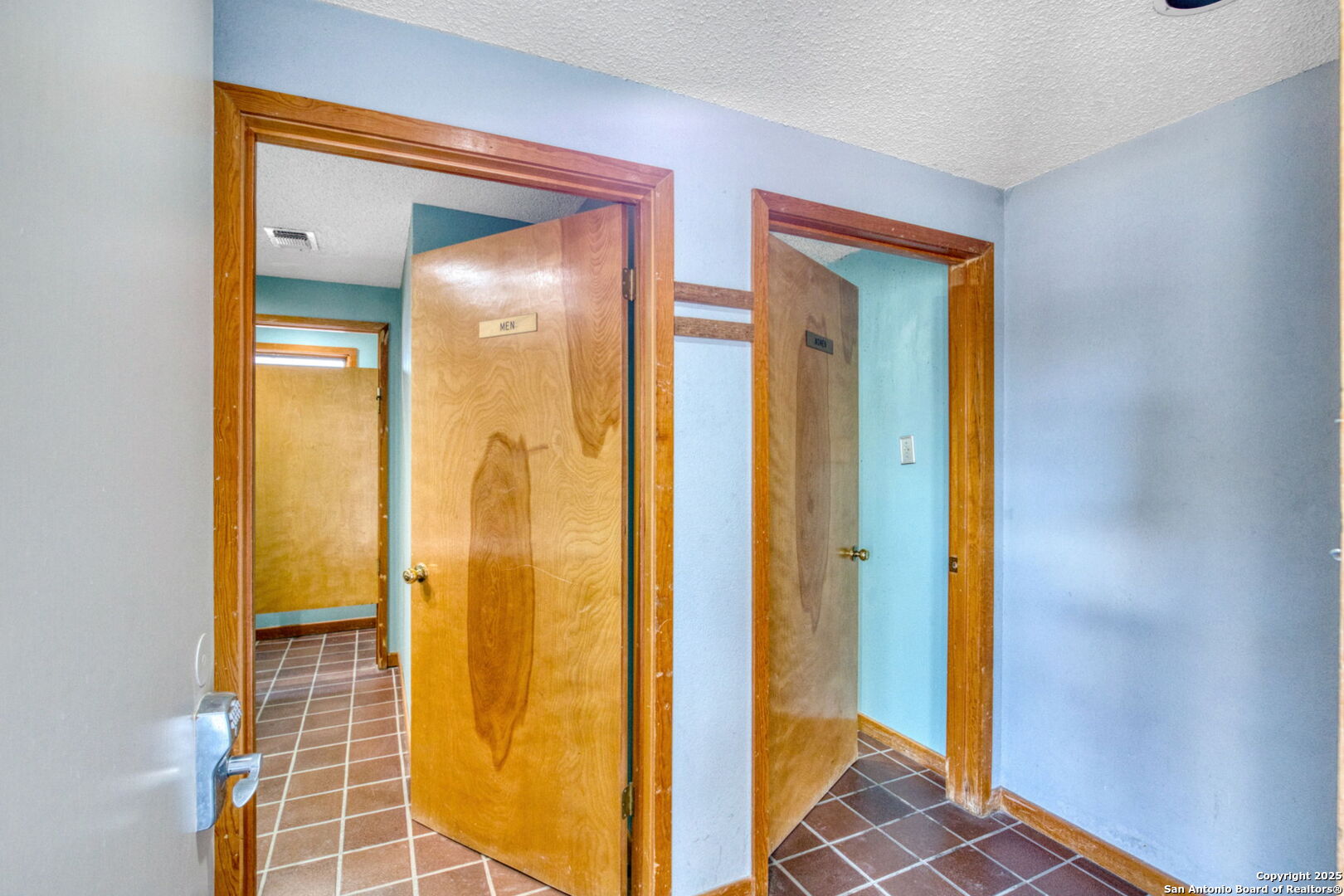 805 Highway 534 Loop, Unit 122 Kerrville, TX 78028 - Photo 28 of 30 a view of a bathroom with a glass door