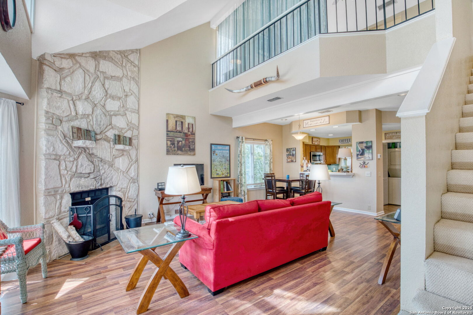 805 Highway 534 Loop, Unit 122 Kerrville, TX 78028 - Photo 4 of 30 a living room with furniture and a fireplace