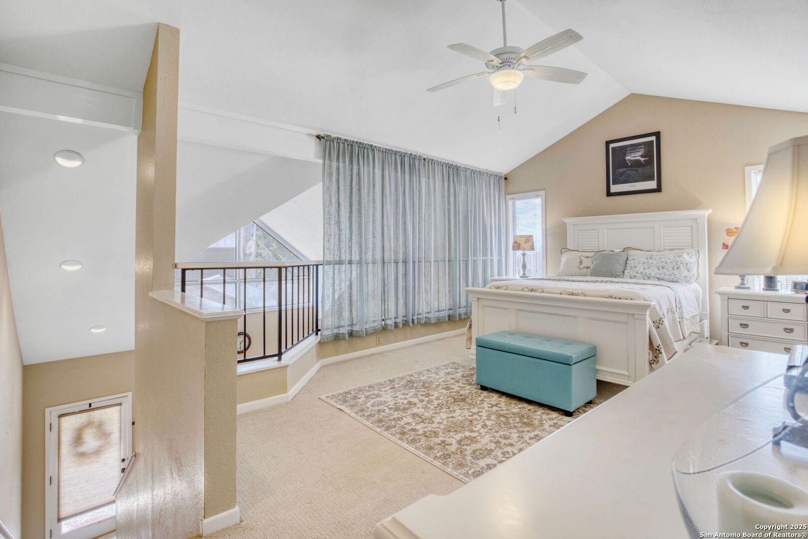 805 Highway 534 Loop, Unit 122 Kerrville, TX 78028 - Photo 6 of 30 a living room with furniture and a chandelier