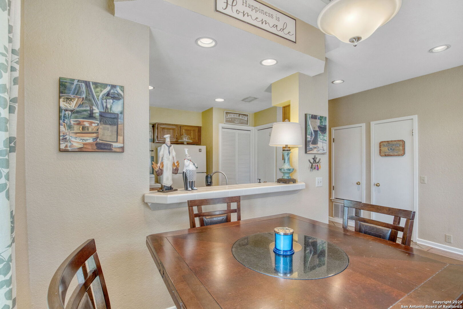 805 Highway 534 Loop, Unit 122 Kerrville, TX 78028 - Photo 10 of 30 a living room with kitchen island furniture and a table