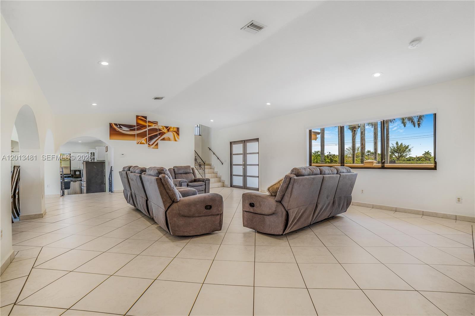 26500 Southwest 167th Avenue Homestead, FL 33031 - Photo 11 of 78 a living room with furniture and a couch