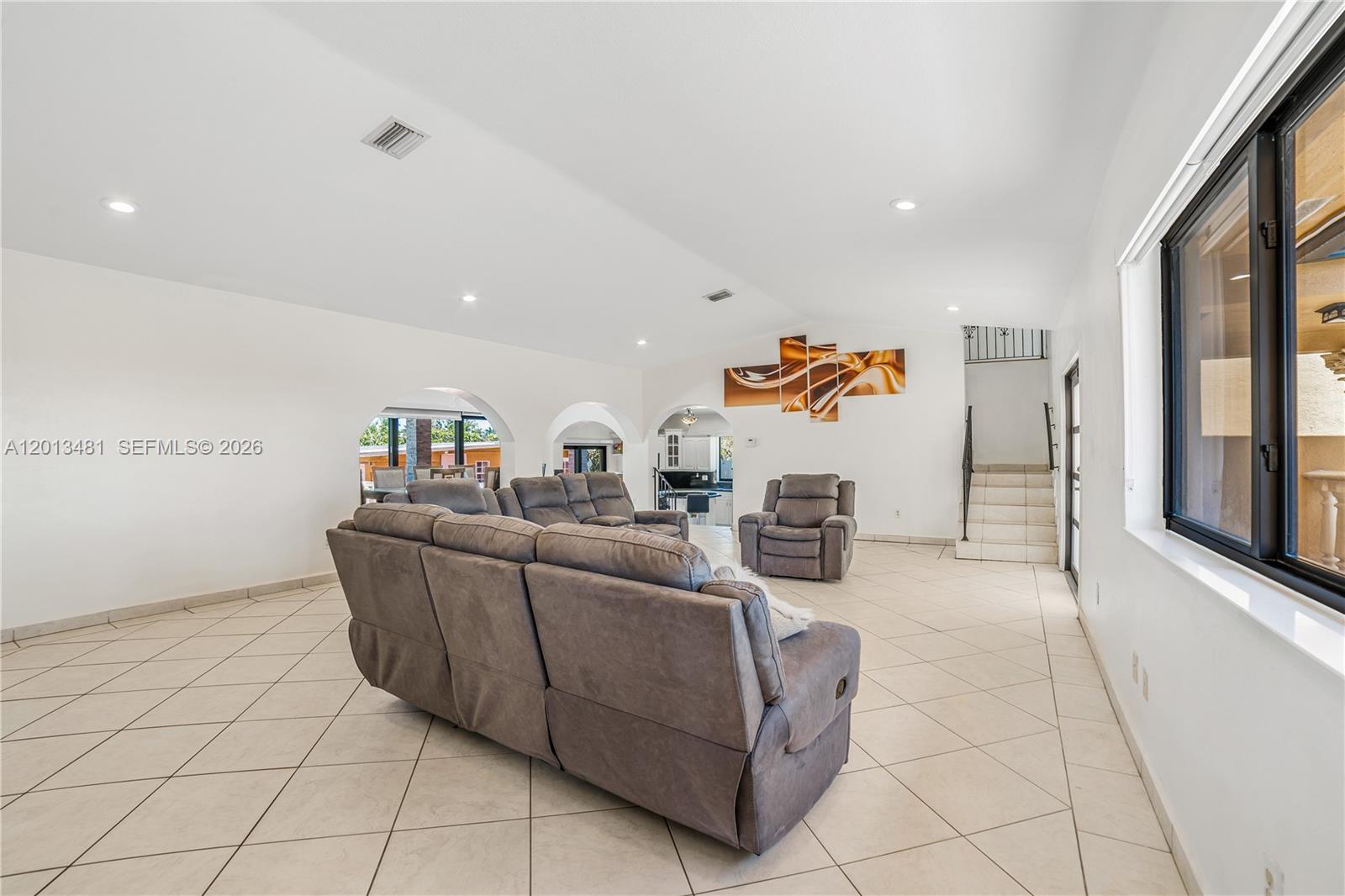 26500 Southwest 167th Avenue Homestead, FL 33031 - Photo 12 of 78 a living room with furniture and a couch