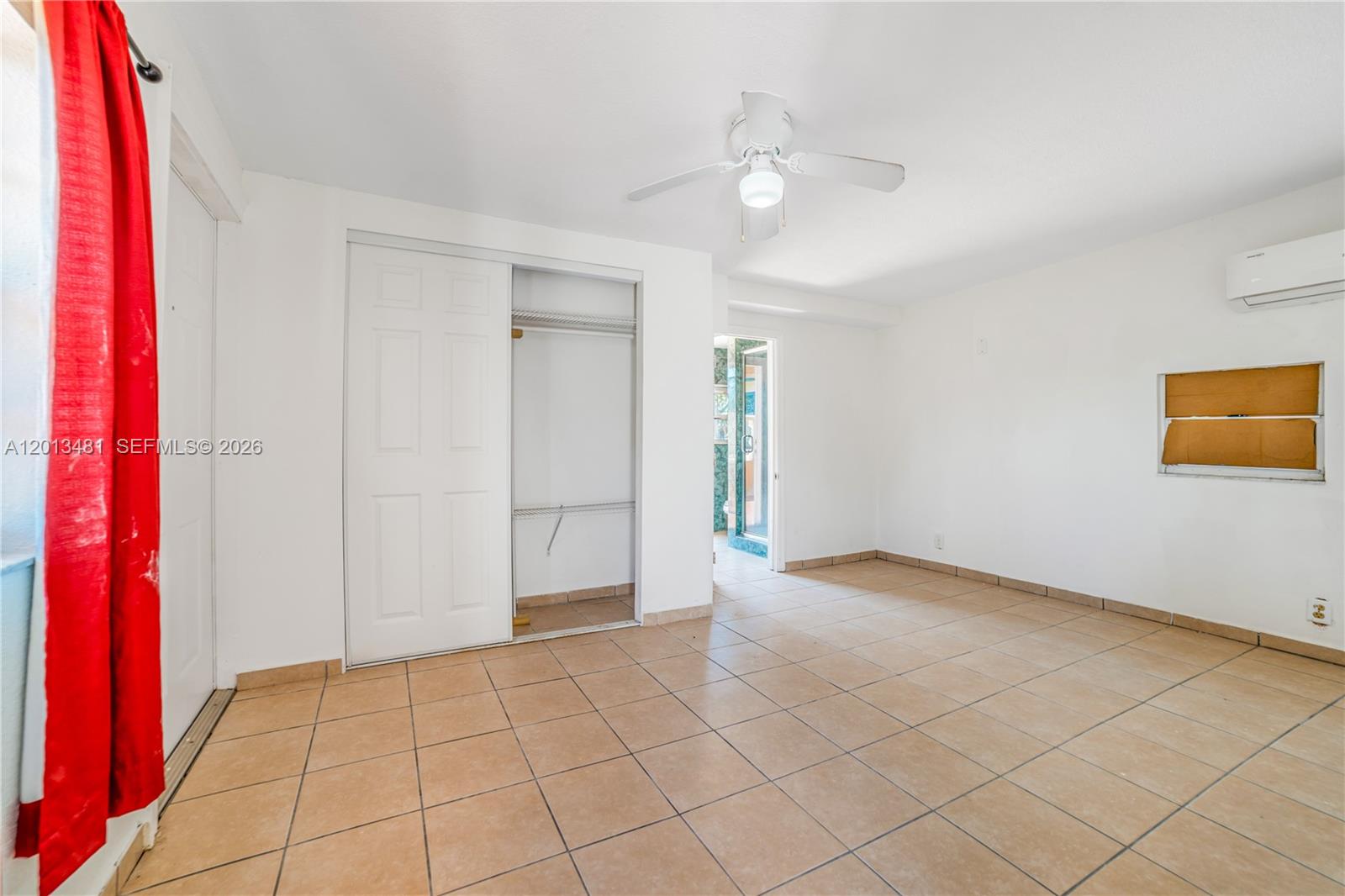 26500 Southwest 167th Avenue Homestead, FL 33031 - Photo 47 of 78 a view of an empty room and window