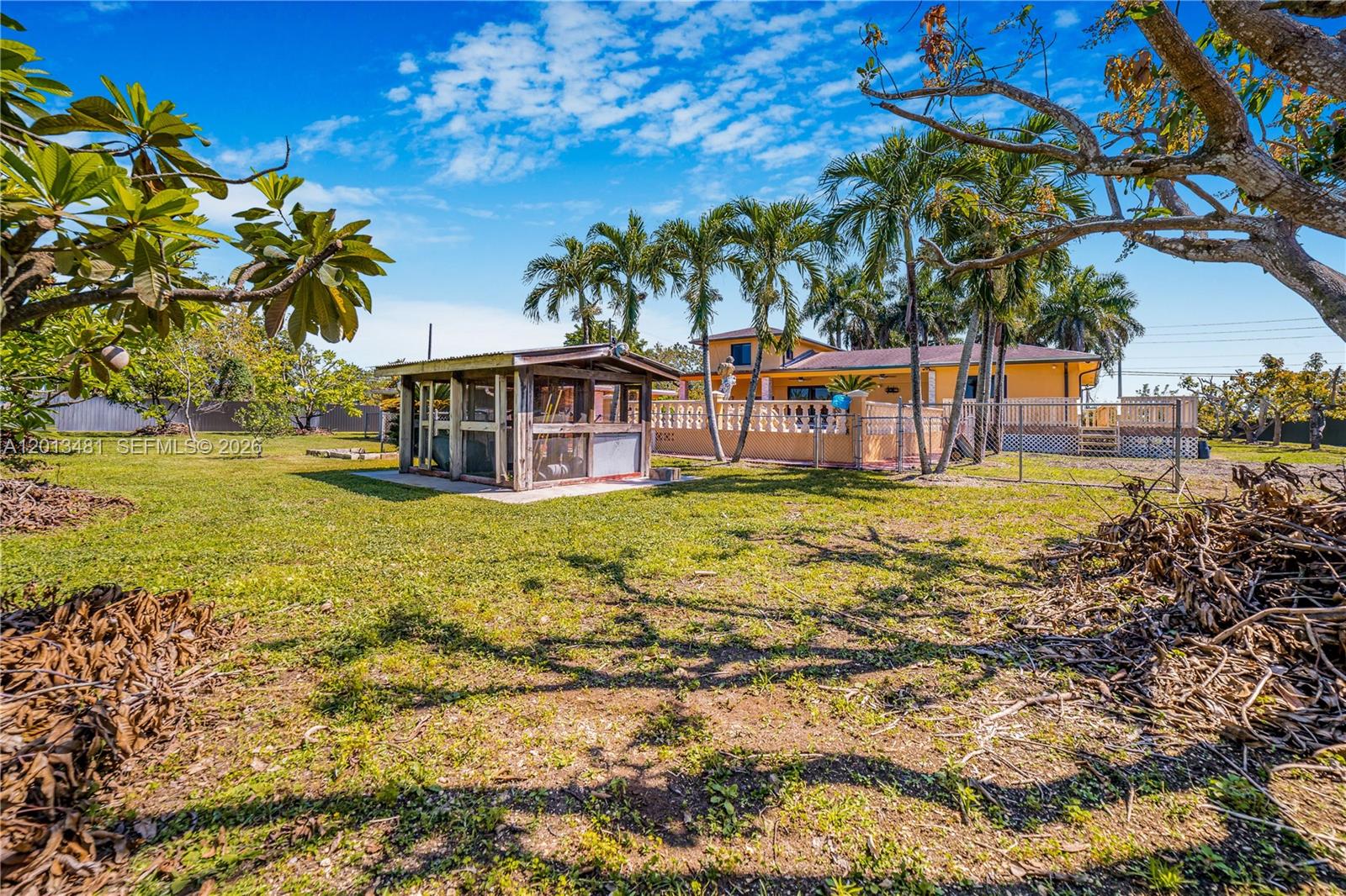 26500 Southwest 167th Avenue Homestead, FL 33031 - Photo 70 of 78 a view of a house with a big yard