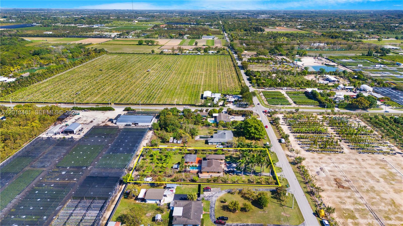 26500 Southwest 167th Avenue Homestead, FL 33031 - Photo 78 of 78 an aerial view of residential houses with outdoor space