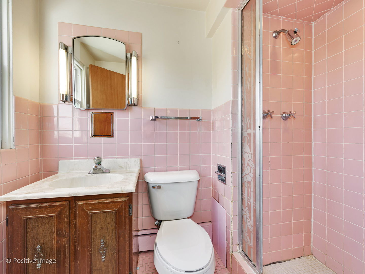 399 Longcommon Road Riverside, IL 60546 - Photo 17 of 25 a bathroom with a sink a toilet and shower