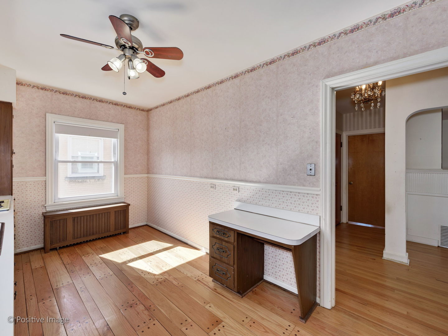 399 Longcommon Road Riverside, IL 60546 - Photo 10 of 25 wooden floor in an empty room with a window