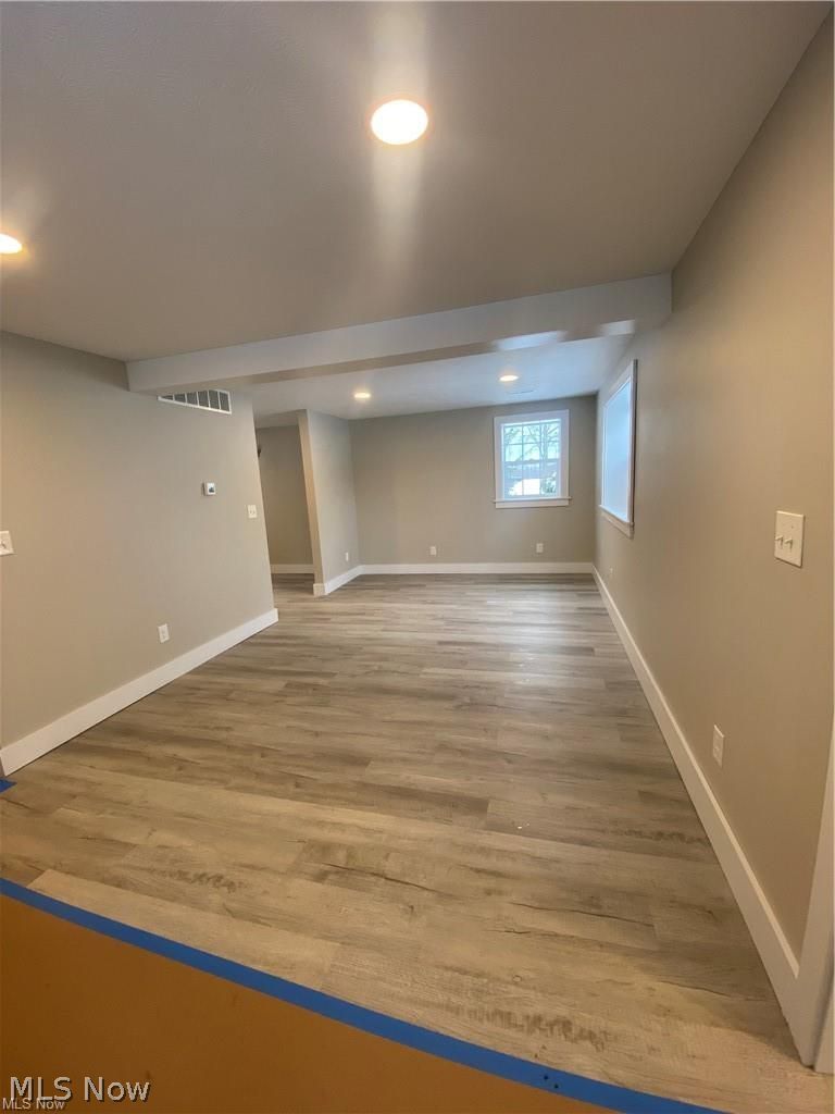 2803 State Road Vermilion, OH 44089 - Photo 10 of 28 Living room with light wood-style flooring and recessed lighting