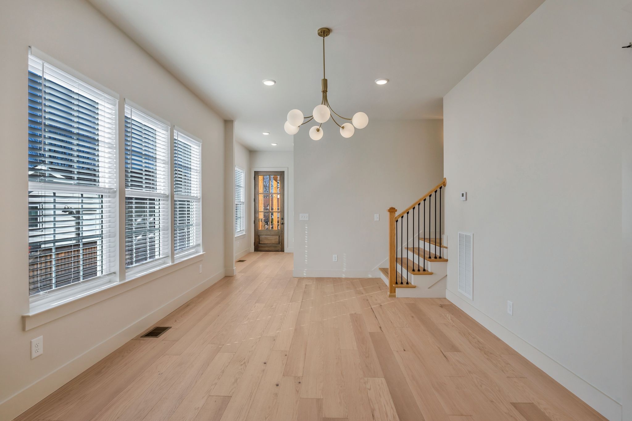 915 B Marilyn Road Nashville, TN 37209 - Photo 13 of 44 a view of a room with wooden floor and a window