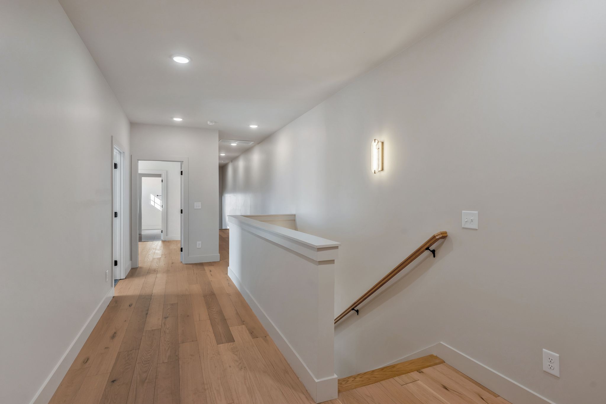 915 B Marilyn Road Nashville, TN 37209 - Photo 20 of 44 a view of hallway with stairs and wooden floor