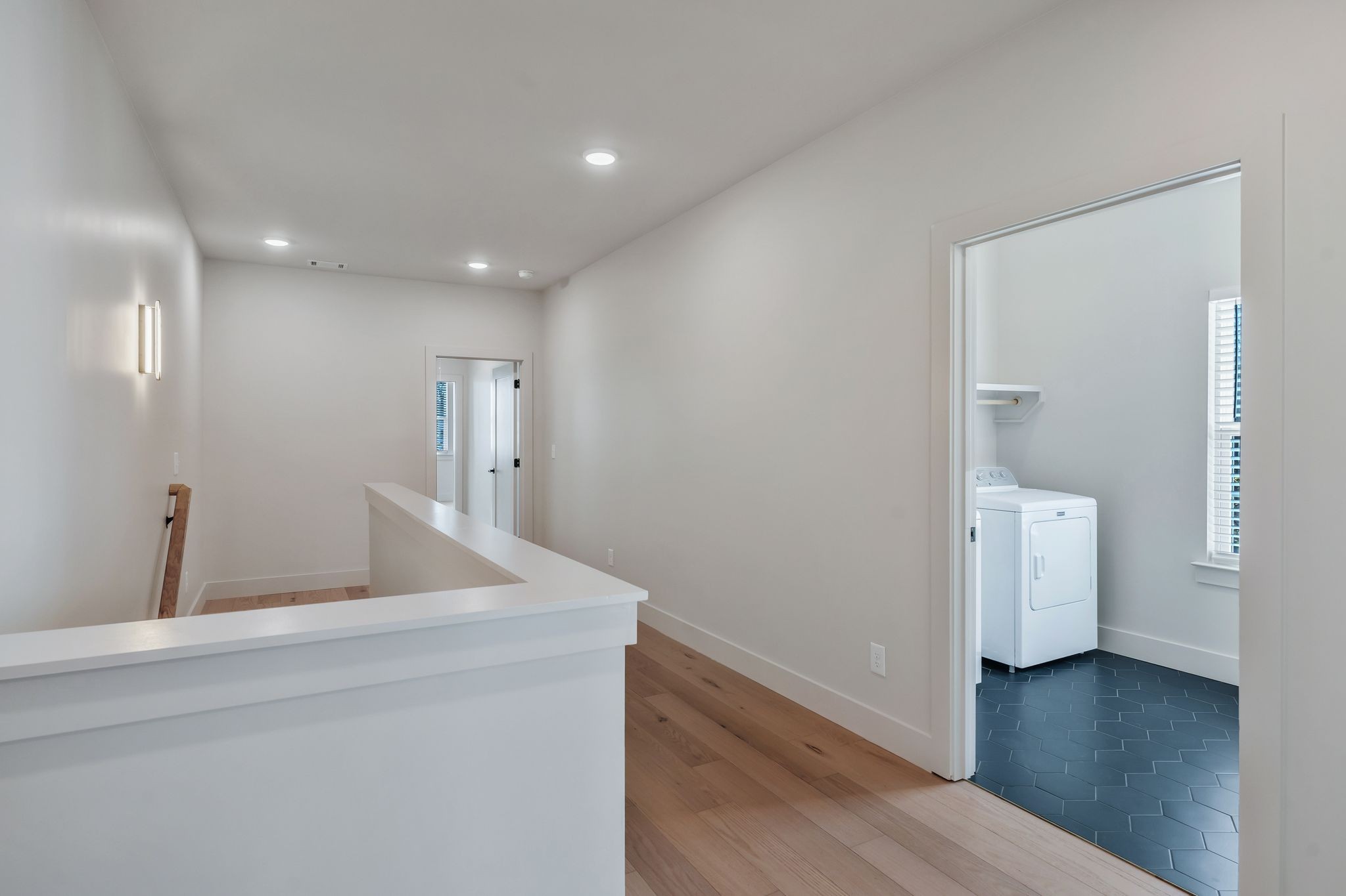 915 B Marilyn Road Nashville, TN 37209 - Photo 21 of 44 a view of a hallway with wooden floor