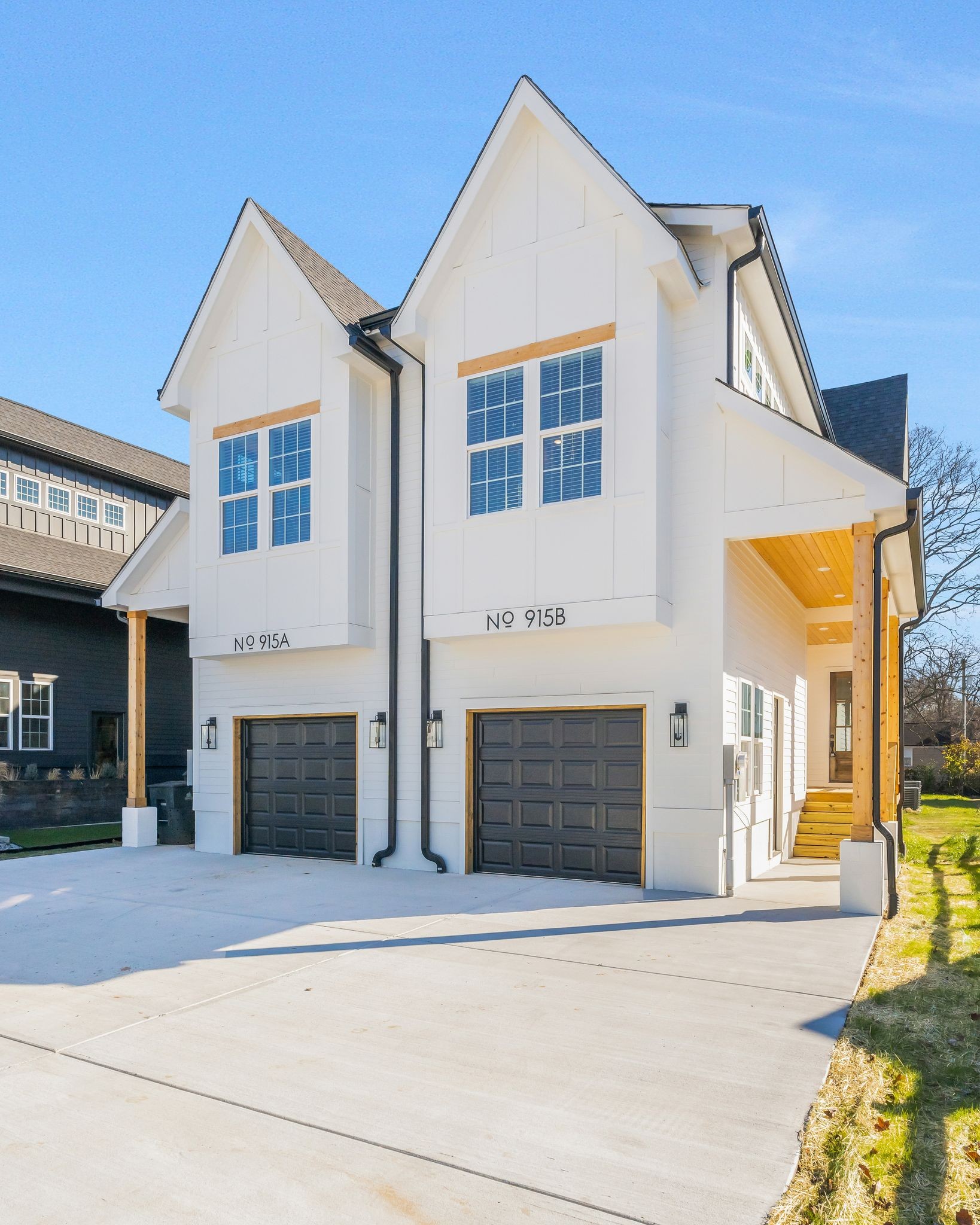 915 B Marilyn Road Nashville, TN 37209 - Photo 3 of 44 a front view of a house with a yard and garage
