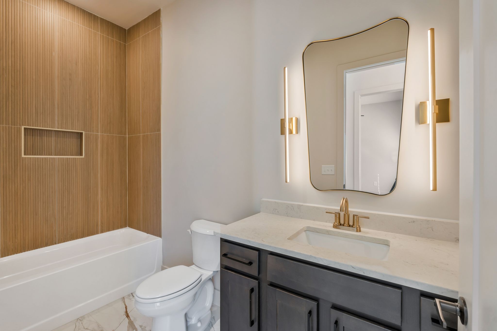 915 B Marilyn Road Nashville, TN 37209 - Photo 10 of 44 a bathroom with a sink a toilet and shower