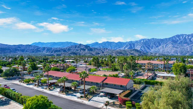 an aerial view of residential houses and street