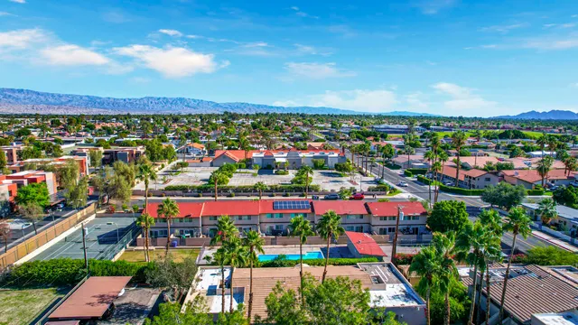 an aerial view of a houses with outdoor space