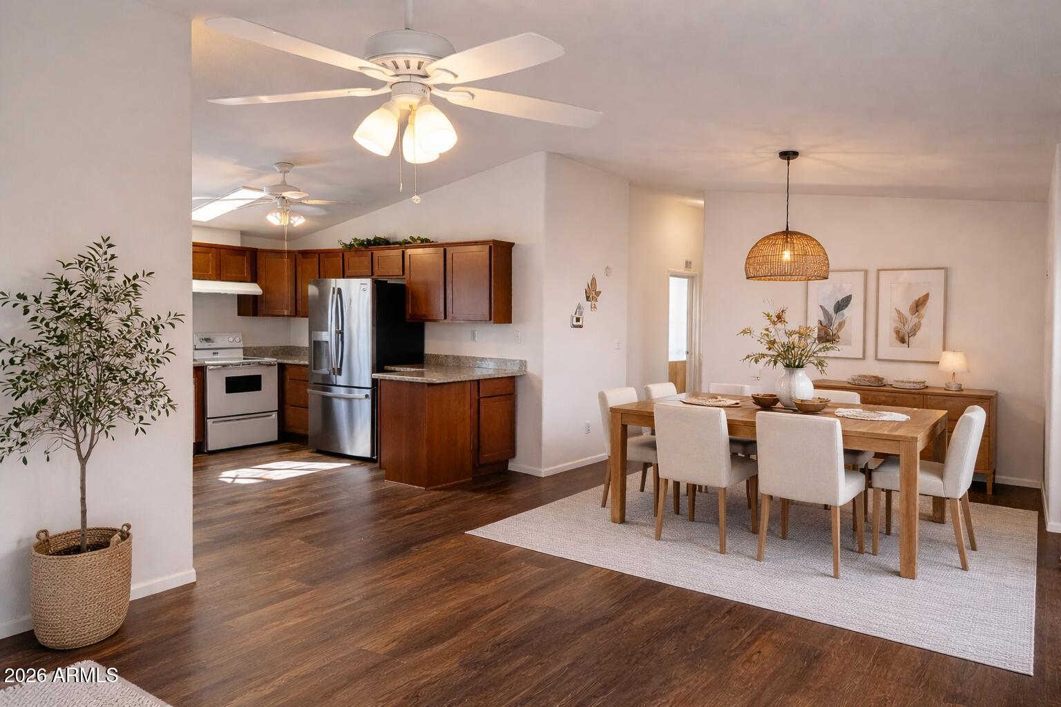 3700 South Tomahawk Road, Unit 13 Apache Junction, AZ 85119 - Photo 5 of 19 a view of a dining room with furniture window and wooden floor