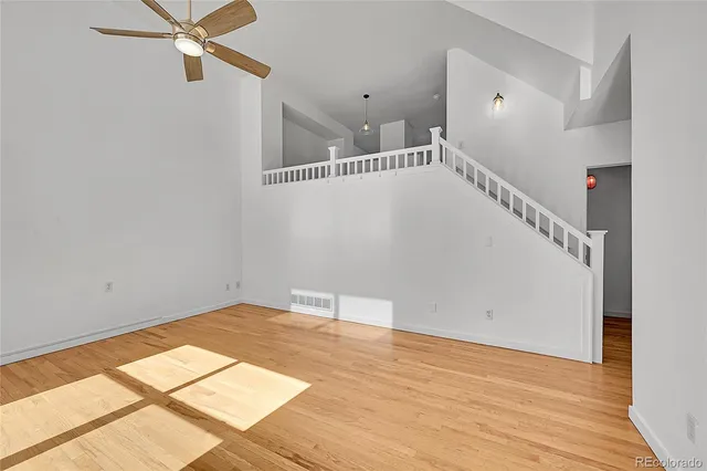 a view of a house with a yard and garage