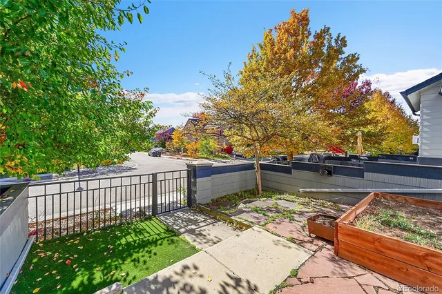 a view of swimming pool from a balcony