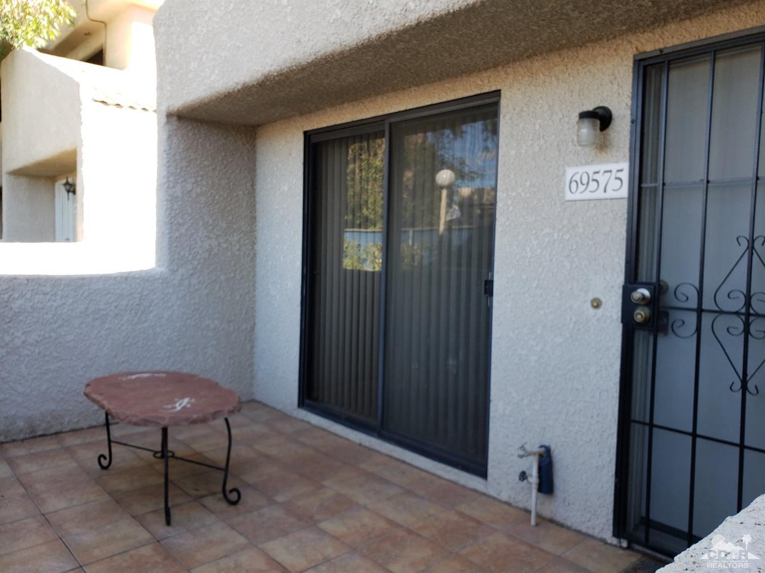 69575 Karen Way Rancho Mirage, CA 92270 - Photo 1 of 14 a view of a hallway with seating area