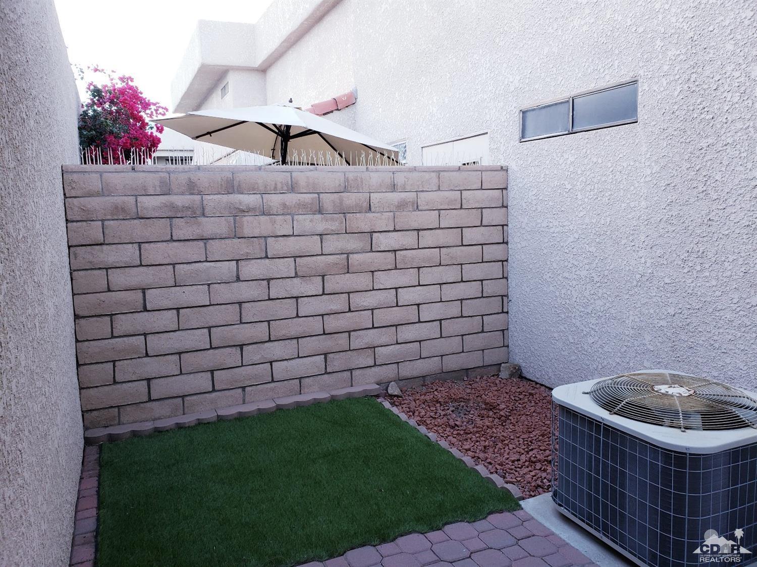 69575 Karen Way Rancho Mirage, CA 92270 - Photo 11 of 14 a bathroom with a sink and a mirror
