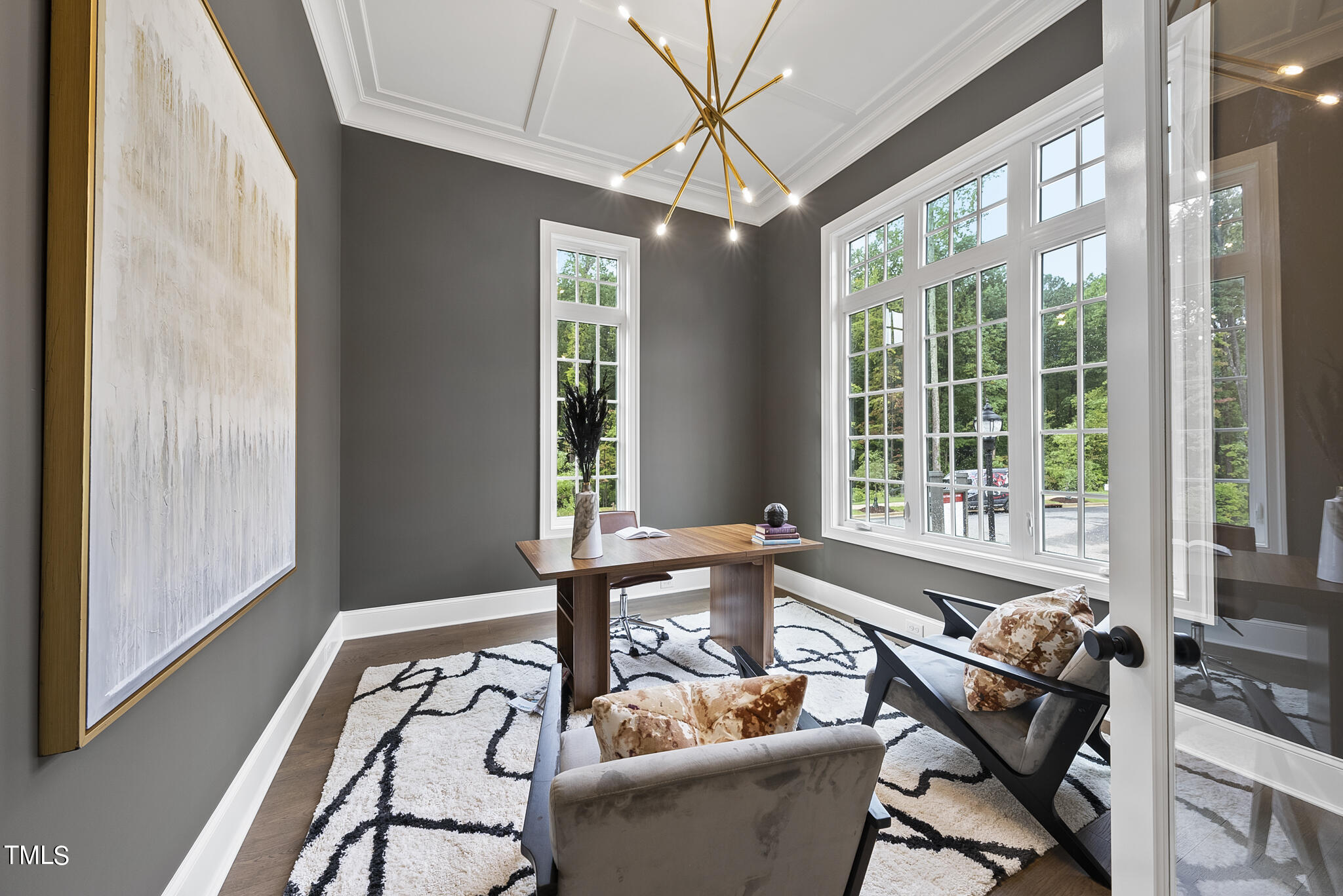 9400 Rawson Avenue Raleigh, NC 27613 - Photo 16 of 33 a living room with furniture and a window