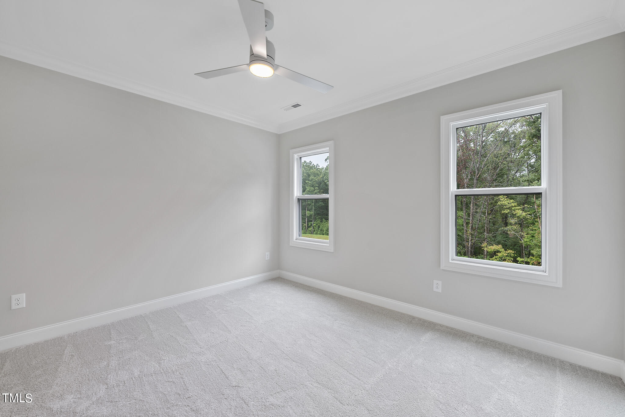 9400 Rawson Avenue Raleigh, NC 27613 - Photo 21 of 33 an empty room with a window