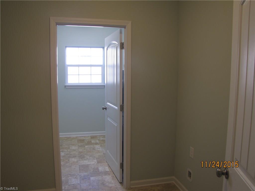 3627 Ruby Road Winston-Salem, NC 27106 - Photo 16 of 30 Walk-in Pantry w/hook up for 2nd fridge and walk-in laundry room with window for natural light. Tons of storage in this home.