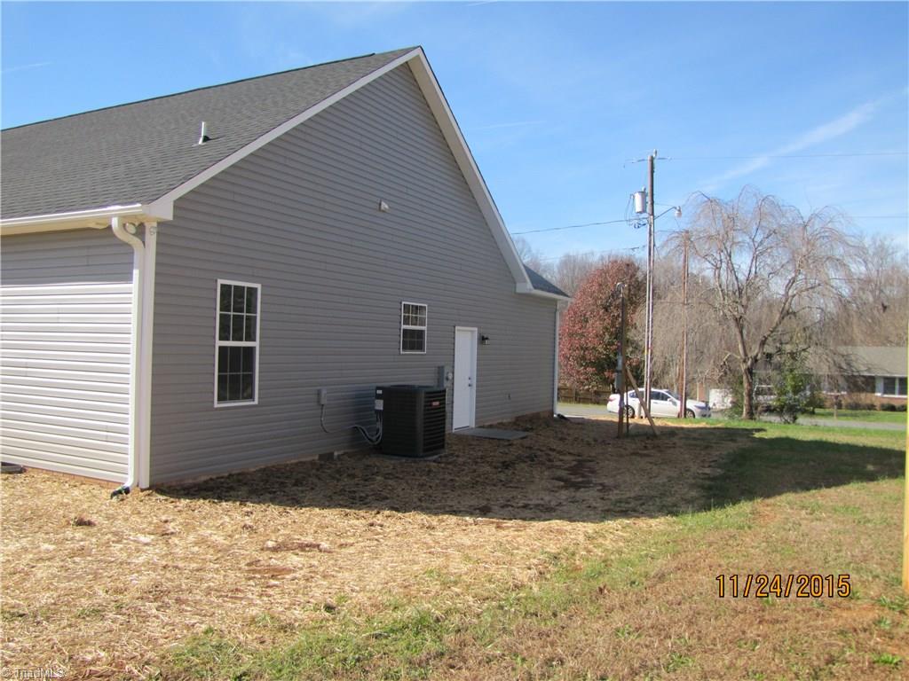 3627 Ruby Road Winston-Salem, NC 27106 - Photo 26 of 30 Side View. Door leads out from garage.