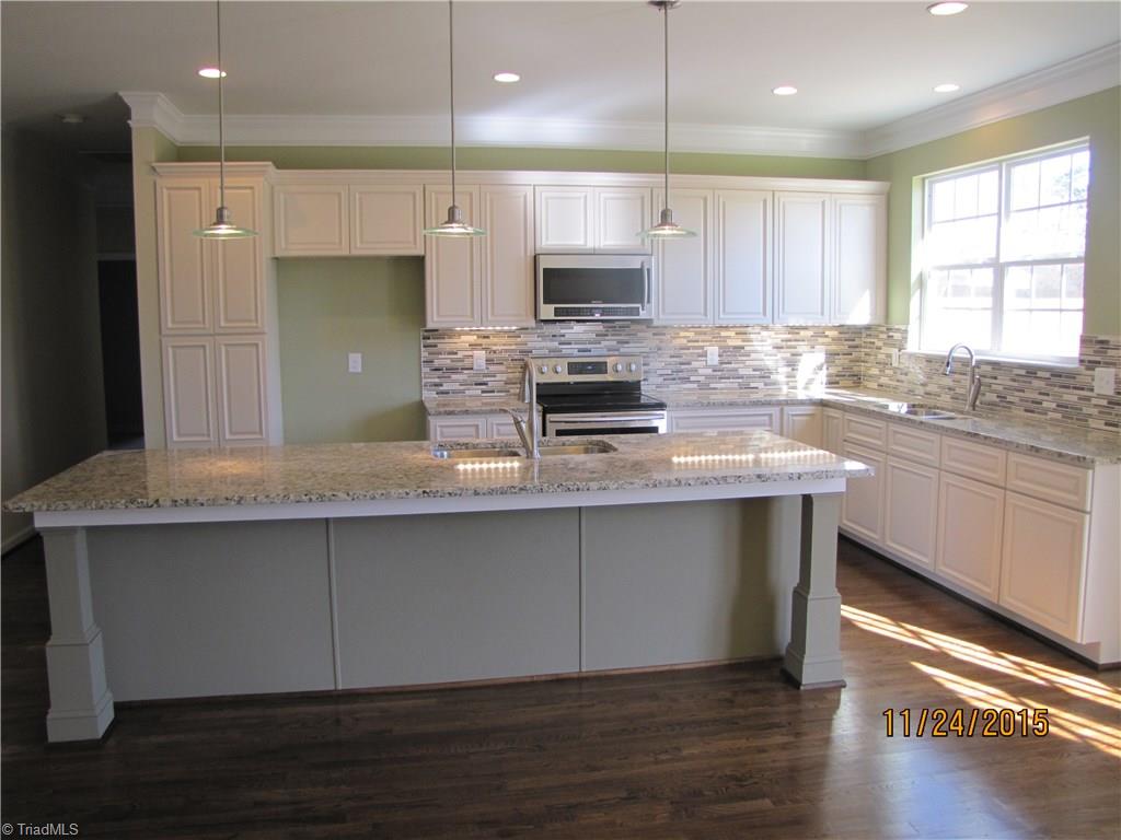 3627 Ruby Road Winston-Salem, NC 27106 - Photo 9 of 30 Looking into the Kitchen from the DR. The island/prep area features a second sink and plenty of room to eat around.