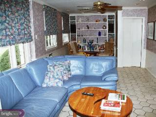 1211 Cox Road Rydal, PA 19046 - Photo 5 of 6 a living room with furniture and a wooden floor