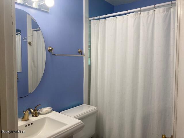 85 Pixley Road Monterey, MA 01230 - Photo 14 of 20 a bathroom with a sink and a mirror