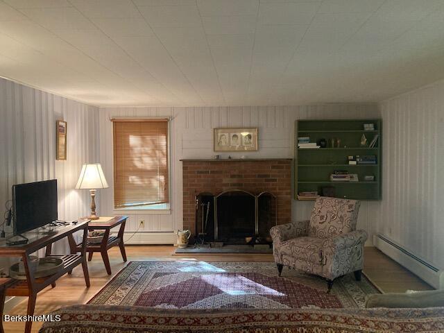 85 Pixley Road Monterey, MA 01230 - Photo 7 of 20 a living room with furniture and a fireplace